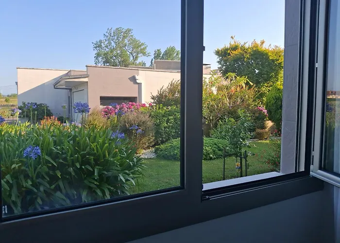 Δωμάτια σε οικογενειακή κατοικία En Casa Moderna Con Jardin *