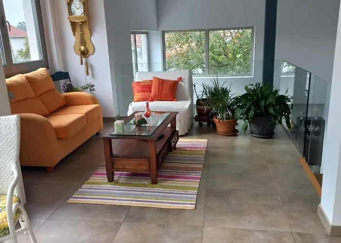 Δωμάτια σε οικογενειακή κατοικία En Casa Moderna Con Jardin *